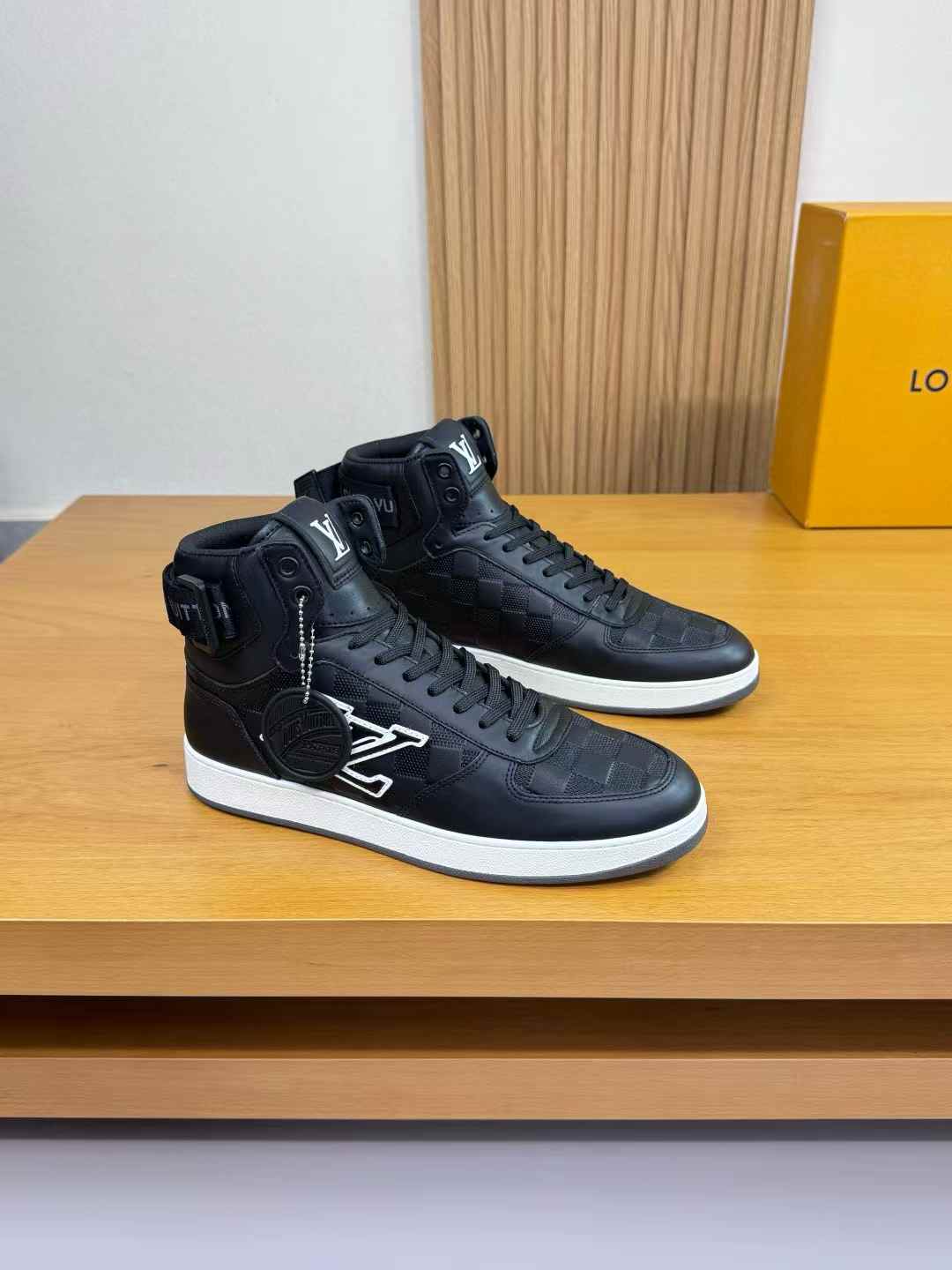 LV Rivoli high-top sneakers in black leather
