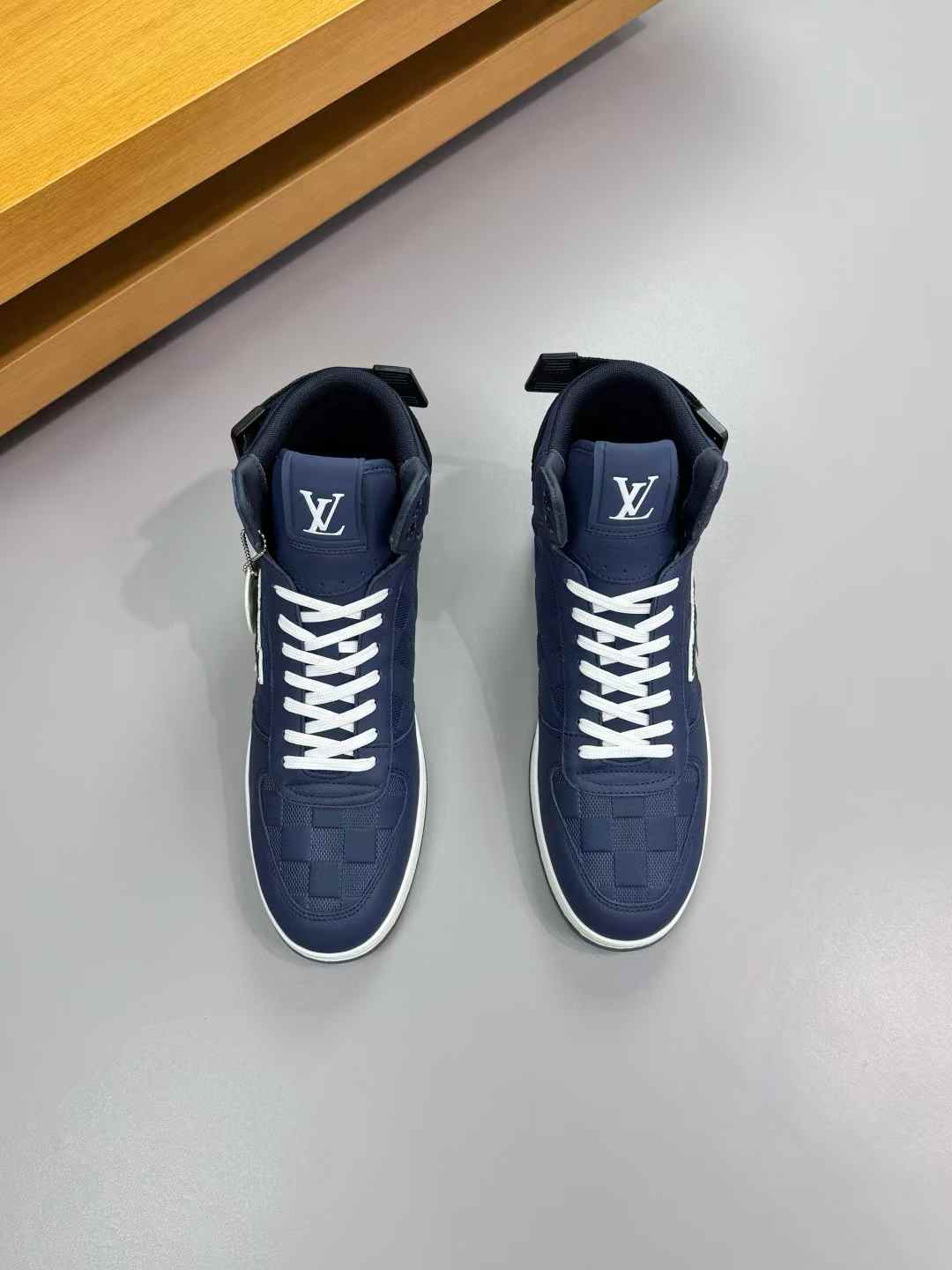 LV Rivoli Sneaker in a high-top style with a blue damier pattern