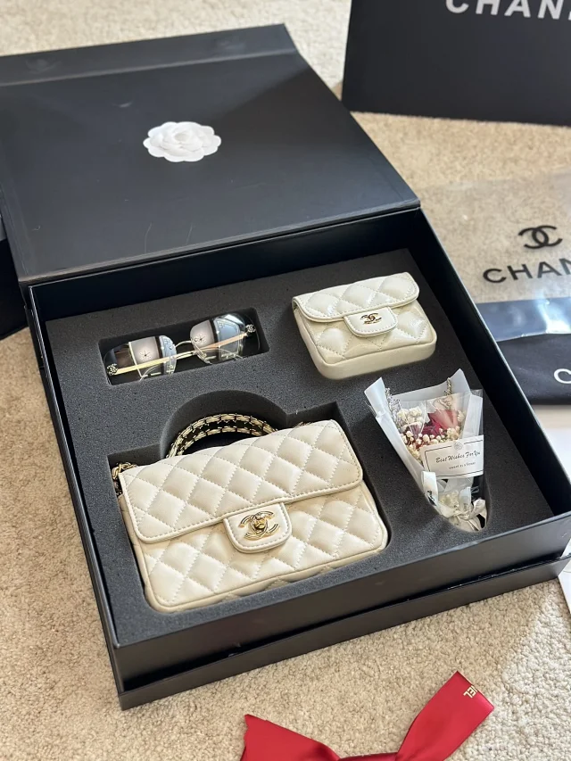 Chanel quilted leather flap bag with a top handle