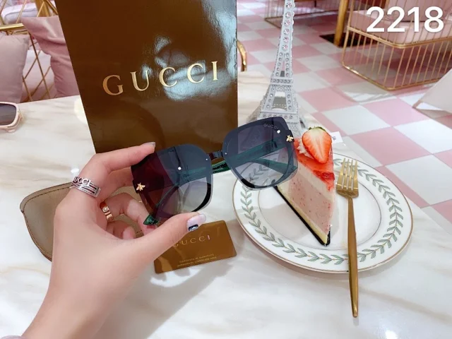 Gucci sunglasses with a bee motif on the temples