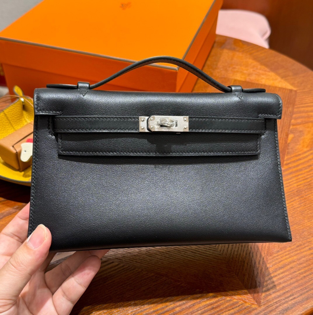 Hermes Kelly Pochette bag in black Swift leather with palladium hardware