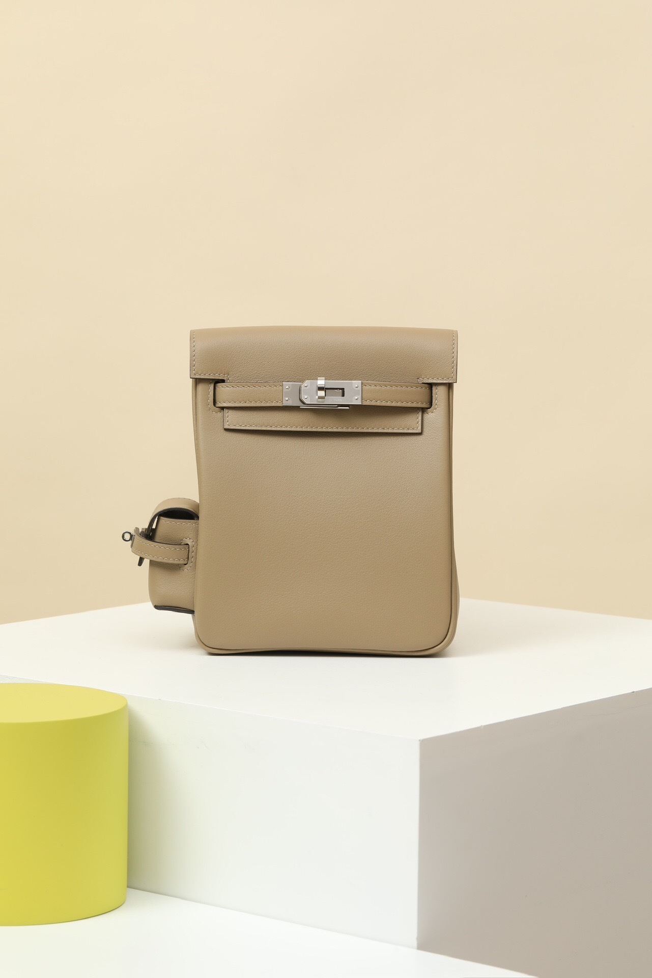 Hermes Mini Kelly Jump Backpack in Beige Marfa Swift leather with silver-toned hardware.