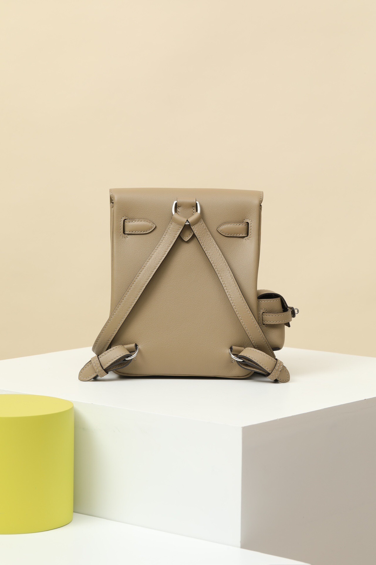 Hermes Mini Kelly Jump Backpack in Beige Marfa Swift leather with silver-toned hardware.