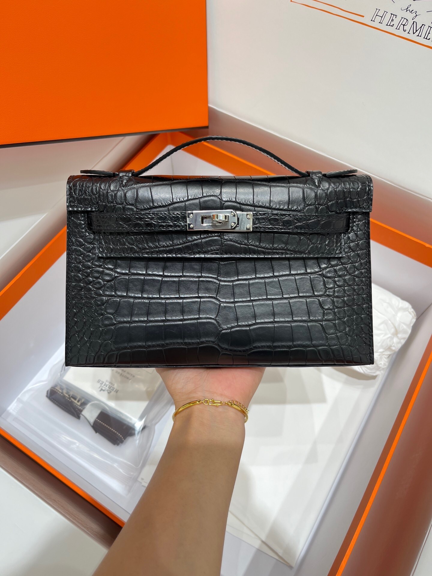 Hermes Kelly Pochette handbag Niloticus crocodile leather