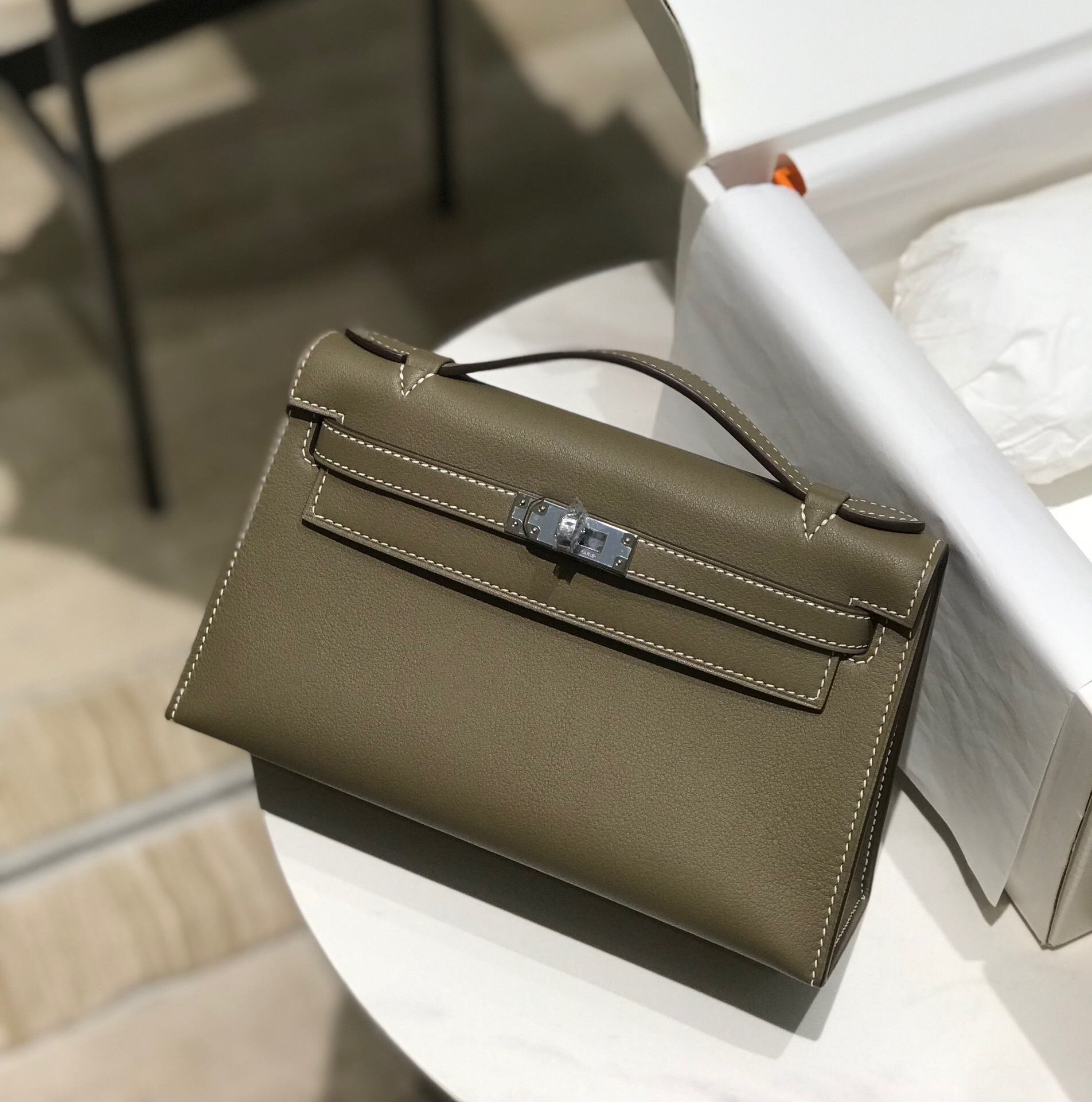 Hermes Kelly Pochette handbag in Swift leather