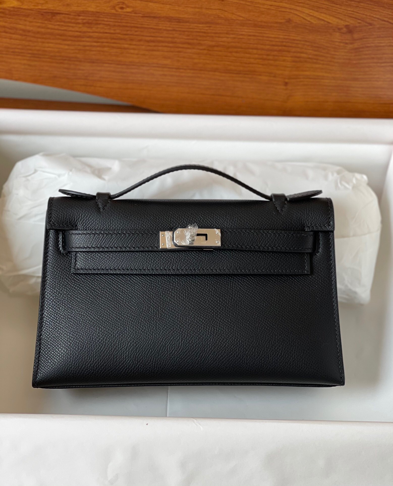 Hermes Kelly Pochette Clutch in Swift leather black with palladium hardware