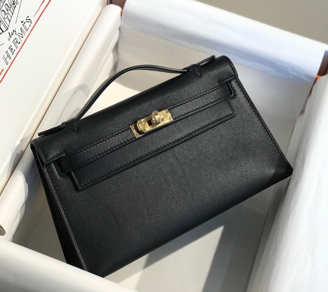 Hermes Kelly Pochette in black Swift leather with gold hardware