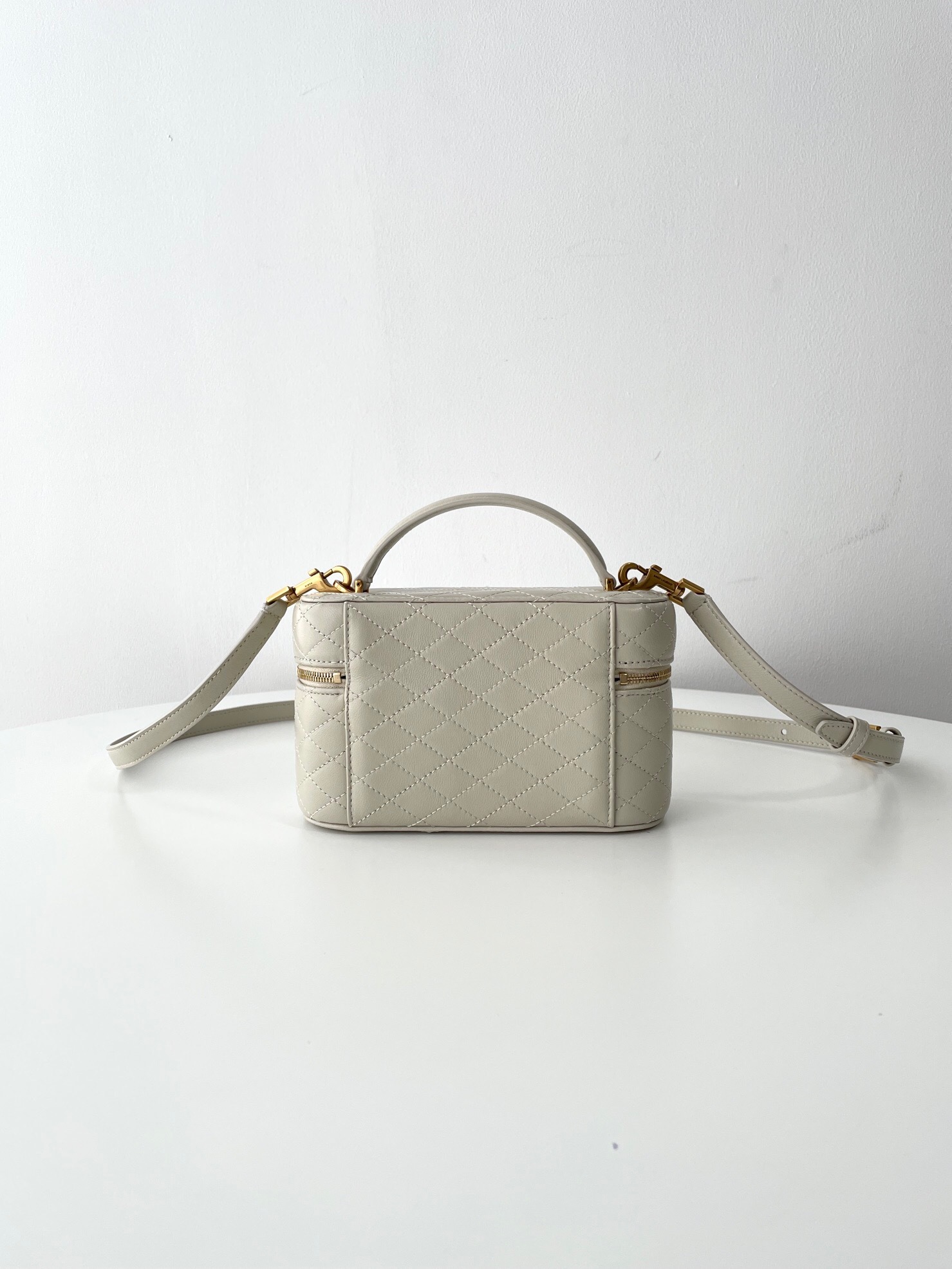 Saint Laurent Gaby Vanity bag in light sand lambskin leather with diamond-quilted overstitching