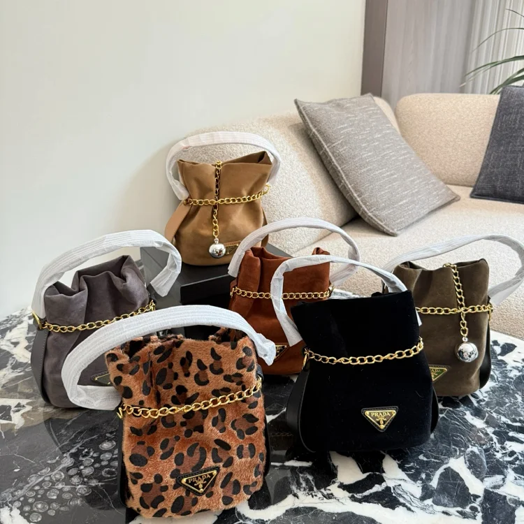 Prada Re-Edition 2005 Re-Nylon bag with a leopard print and chain strap