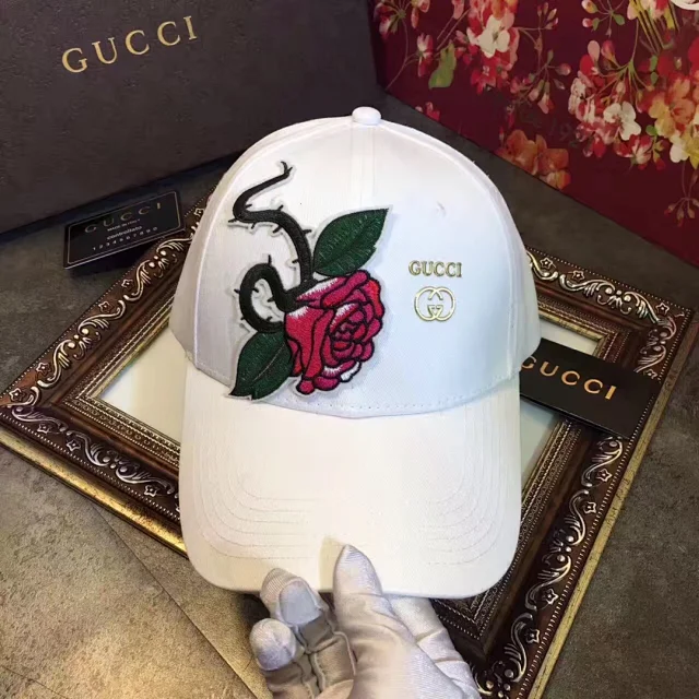 Gucci baseball cap with a rose and snake embroidery