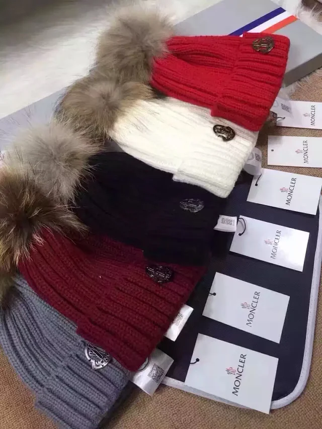 Moncler ribbed knit beanie with a pom-pom