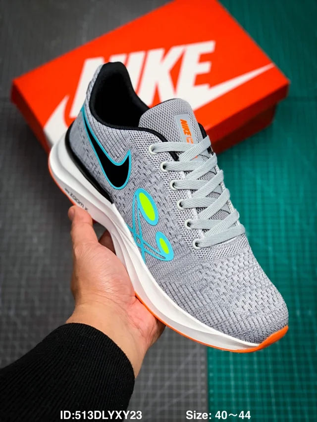 Nike Air Zoom Pegasus 39 road running shoes in a grey colorway
