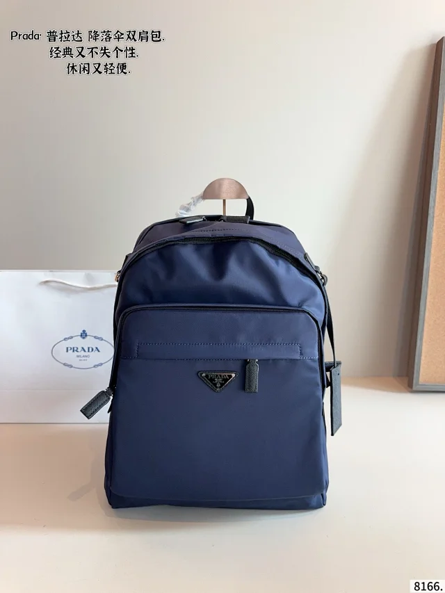 Prada Re-Nylon and Saffiano Leather Backpack in navy blue