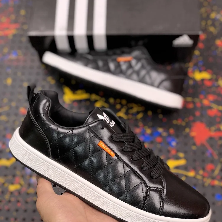 Addidas Originals sneakers with a quilted pattern and white soles