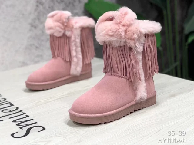 UGG Darlala Classic II boots in pink with fringe and faux fur