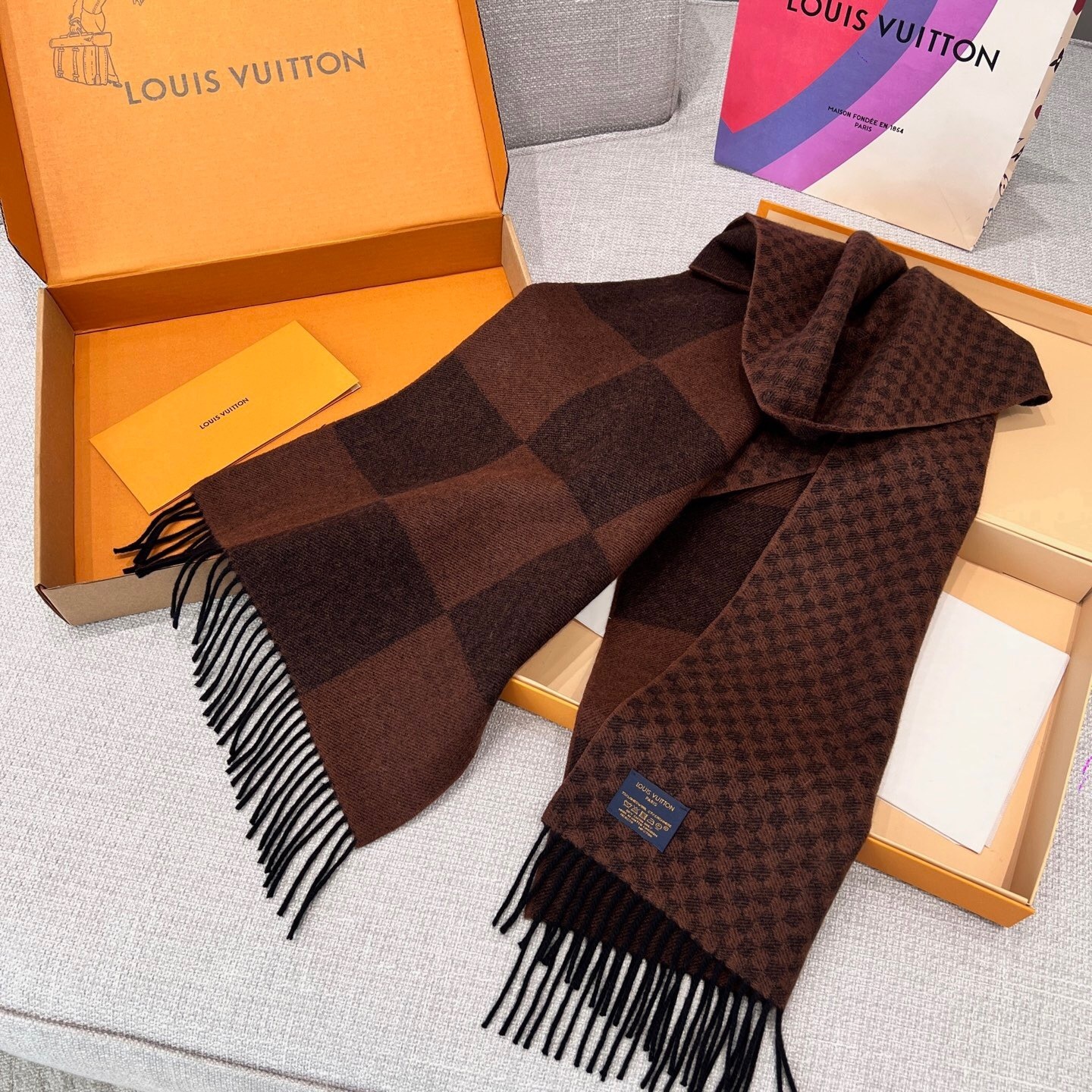 LV reversible scarf with a Monogram pattern on one side damier