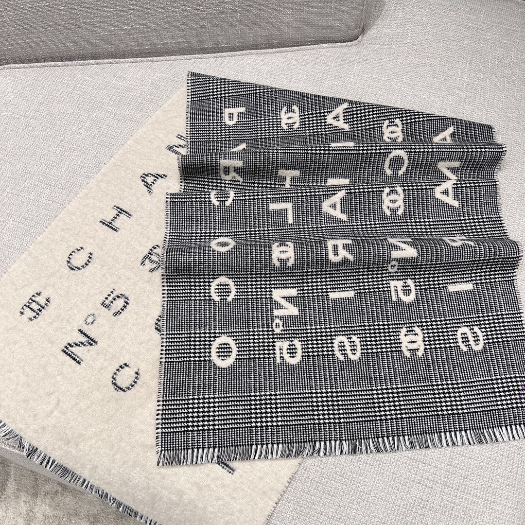 Chanel scarf with a black and white plaid pattern
