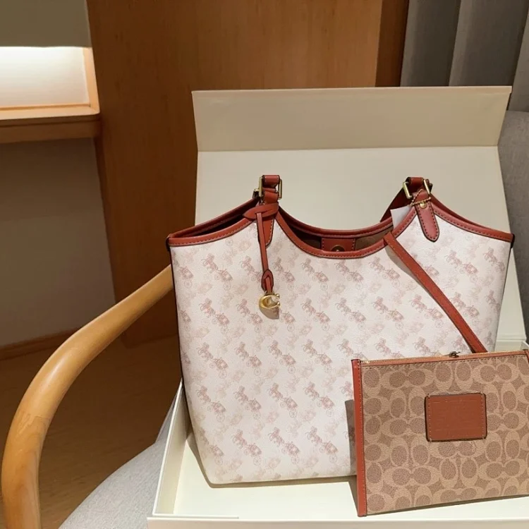 Coach C6336 Day Tote in Signature Canvas with a removable zip pouch in the color Tan Rust