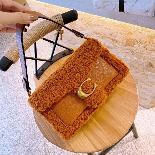 Coach Tabby shoulder bag with a sherpa and leather design