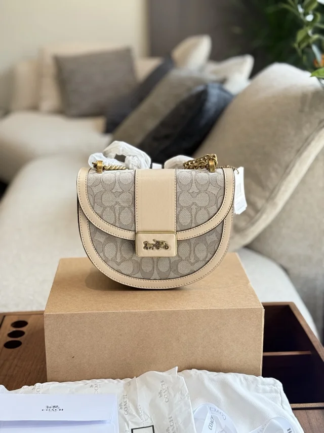 Coach Alie Saddle Bag in Signature Jacquard and refined calf leather in the color Stone Ivory