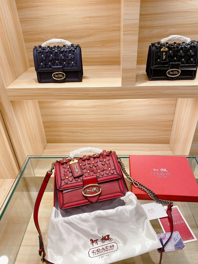 Coach Riley Top Handle 22 with floral applique in red leather