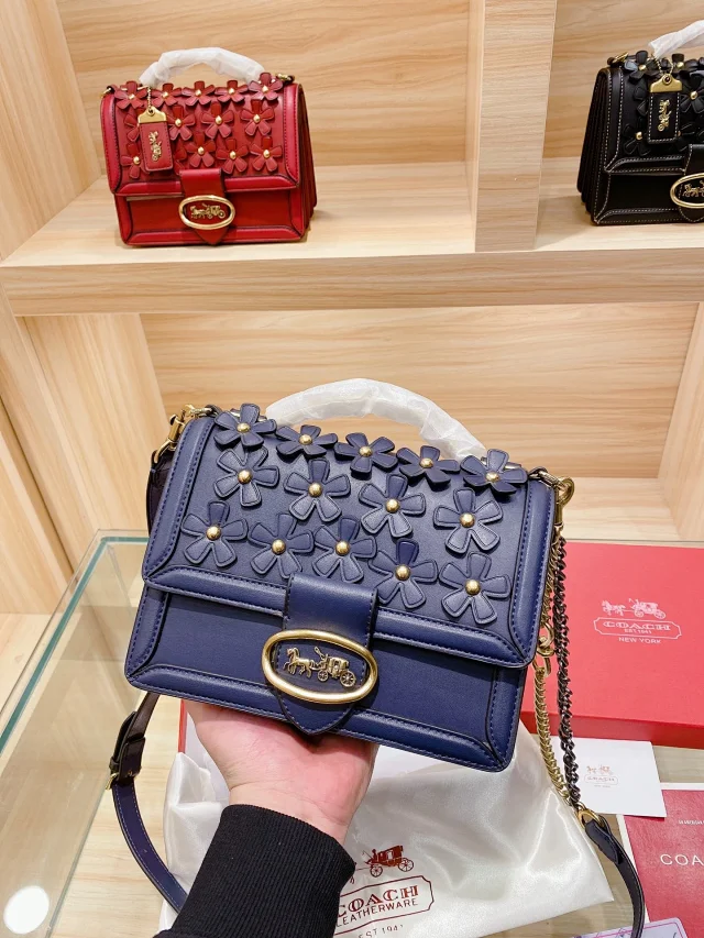 Coach Riley Top Handle 22 With Floral Applique in chalk-colored glovetanned leather