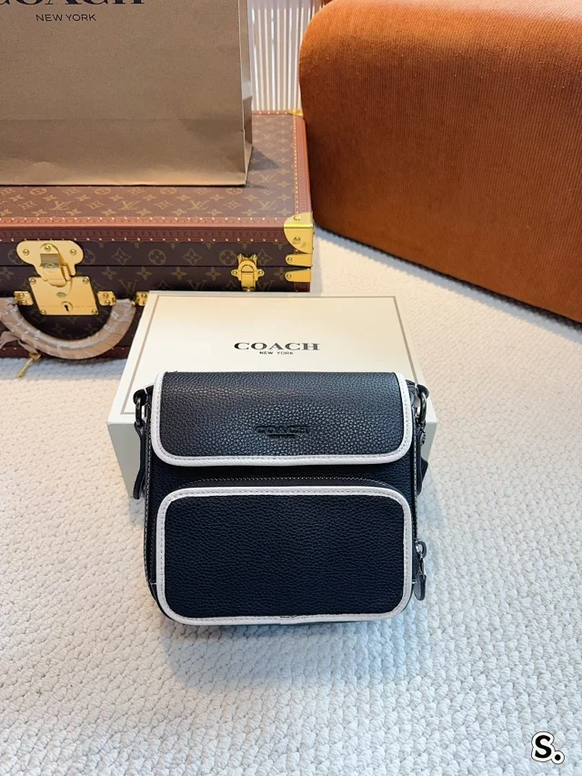 Coach Sullivan Flap Crossbody bag in black pebble leather with white trim