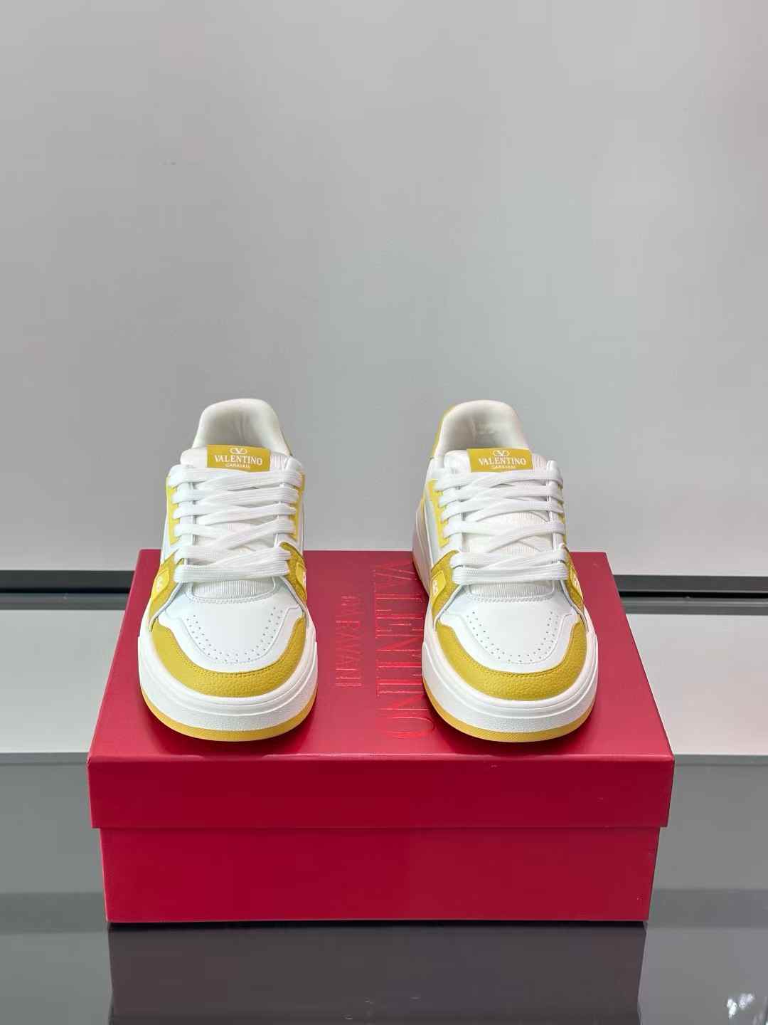 valentino Trainer low-top sneakers in a white and yellow colorway