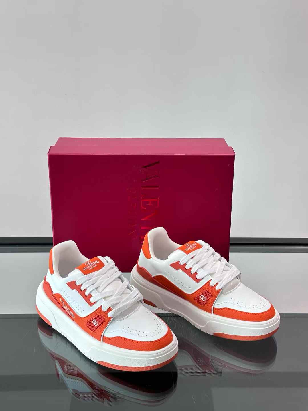 valentino Trainer sneaker in orange and white