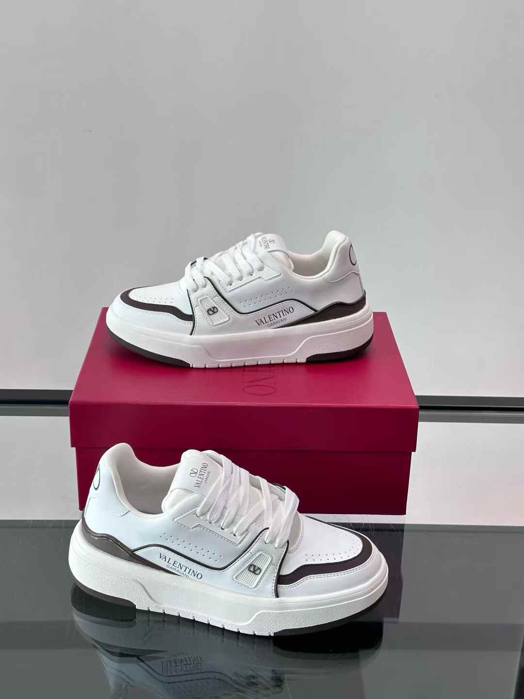 valentino white sneakers with black trim