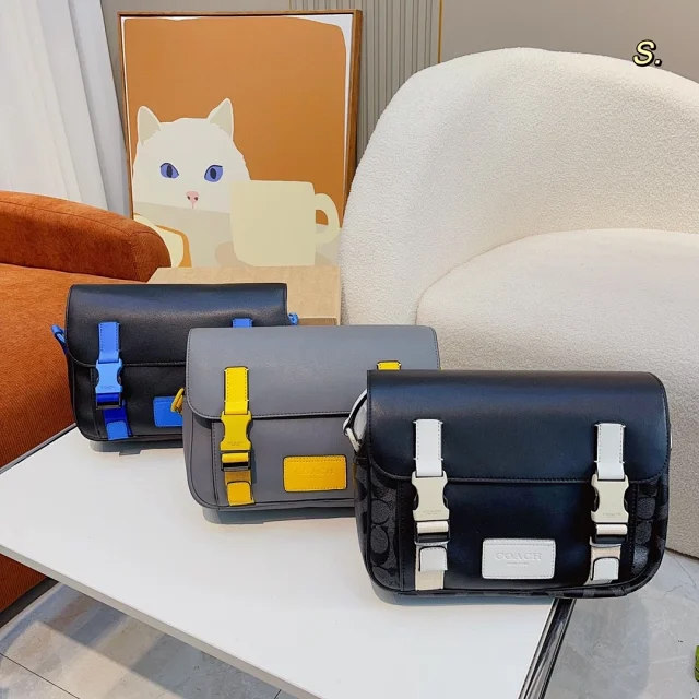 Coach Track Crossbody Bag in dark grey with yellow accents