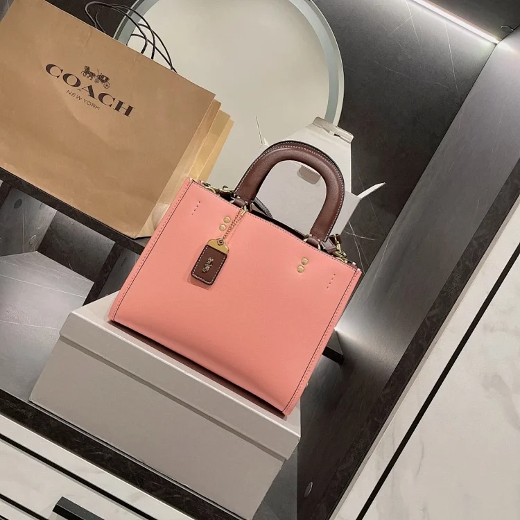 Coach Rogue 17 bag in pink glovetanned leather