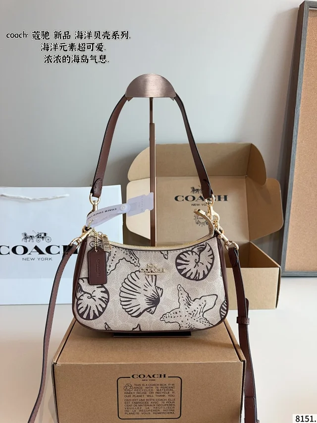 Coach Nolita 19 in Signature Canvas with Shell Print bag