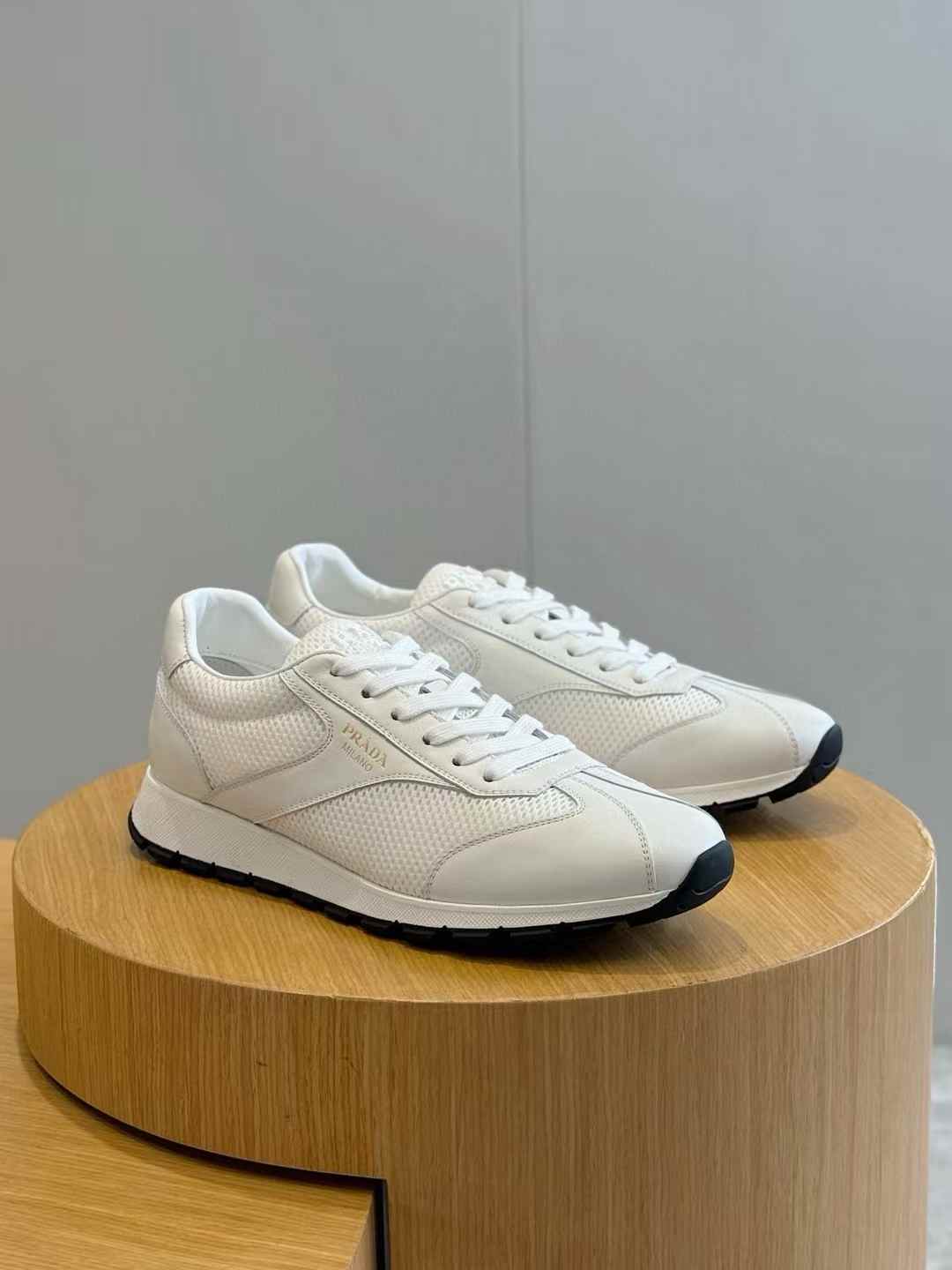 Prada America's Cup leather and mesh sneakers in white