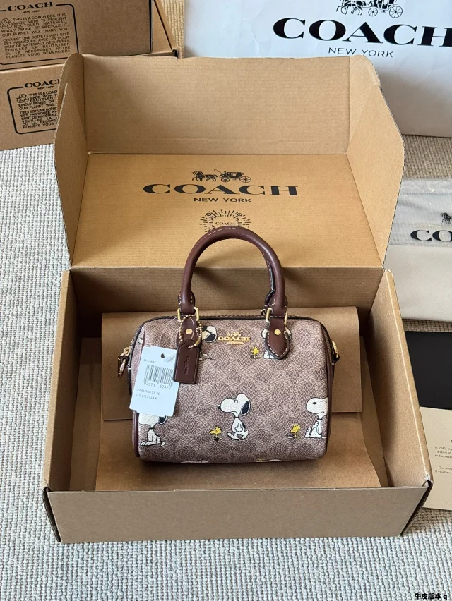 Coach X Peanuts Rowan Satchel Bag in signature canvas with a Snoopy print