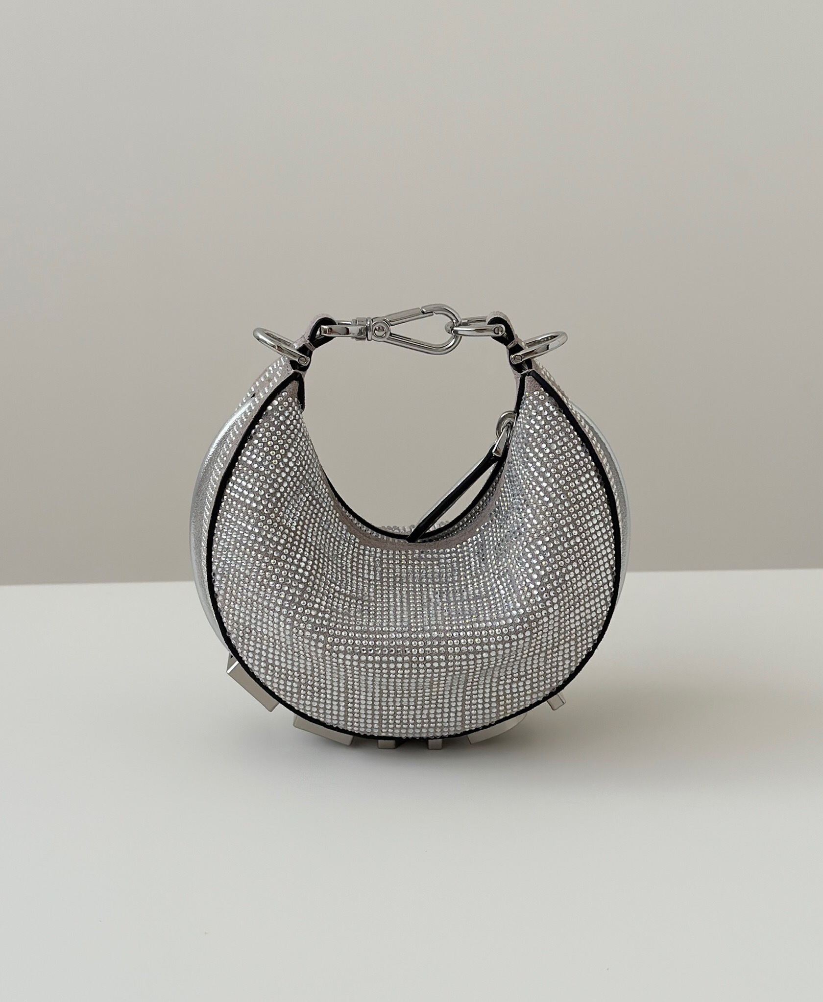 Fendi Fendigraphy Mini bag in grey with all-over rhinestones and a metal Fendi lettering logo