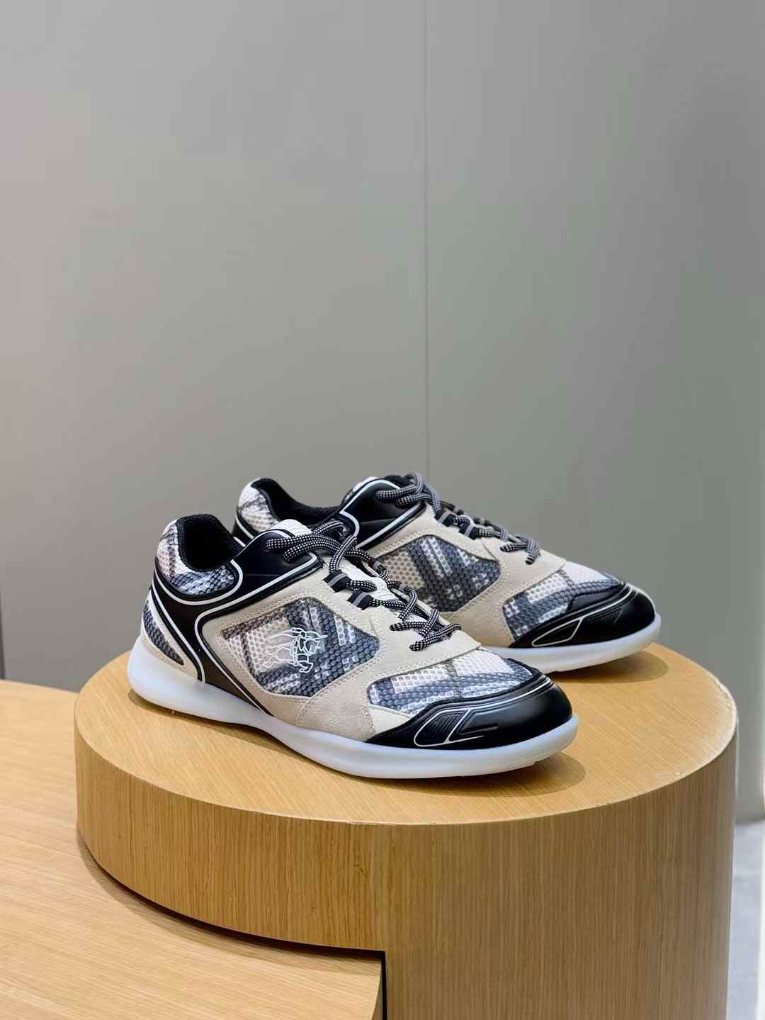 burberry pair of men's sneakers with a black and white pattern