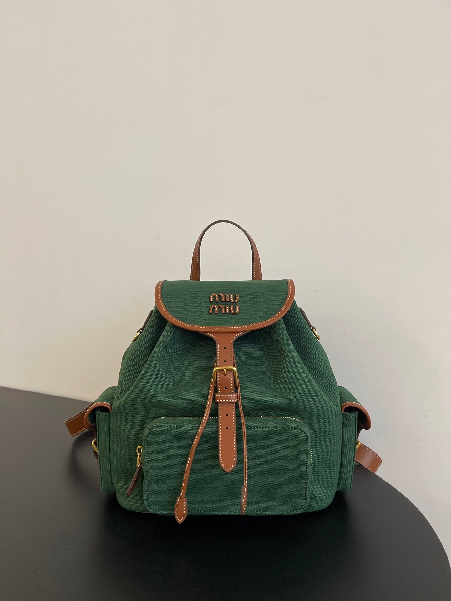 Miu Miu Canvas and Leather Backpack in billiard green with brandy brown leather trim