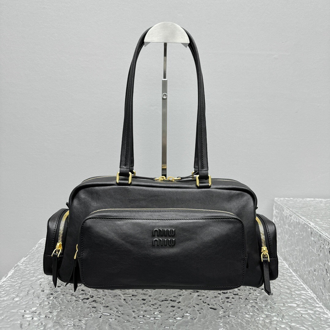 Miu Miu black calf leather Pocket shoulder bag.