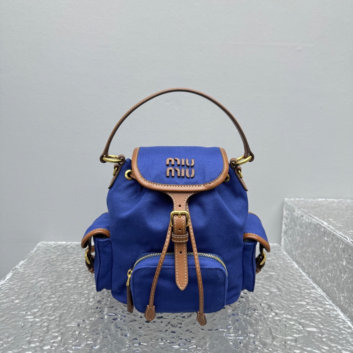 Miu Miu leather-trimmed canvas backpack in blue