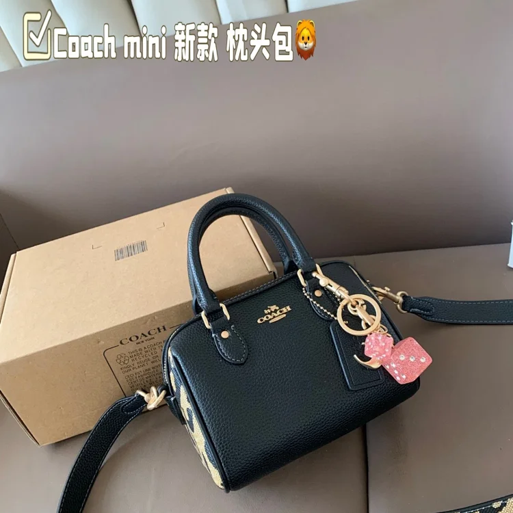 Coach Mini Rowan Crossbody bag in black with a leopard print detail