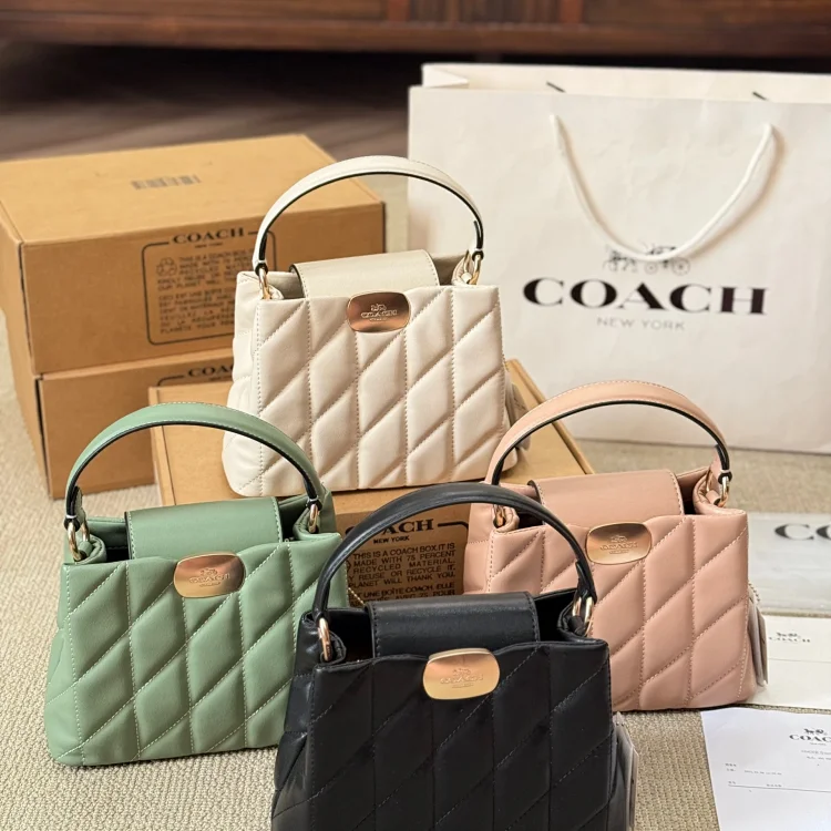 Coach Eliza Shoulder Bag with a zipper closure all color