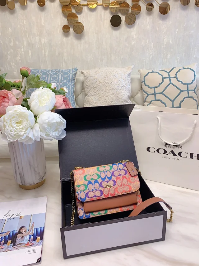 Coach Klare Small Crossbody Bag in a signature canvas with a multi-color print