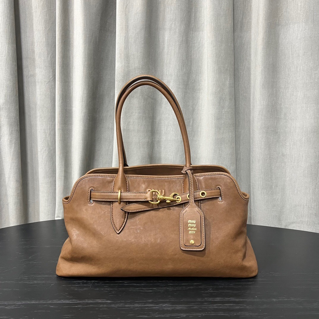 Miu Miu Aventure nappa leather bag in camel brown