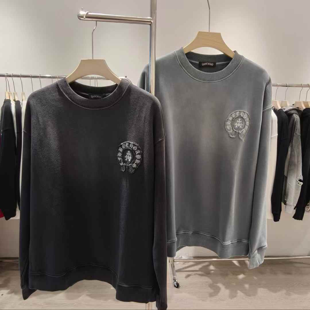 Chrome Hearts sweatshirt with a horseshoe and gothic cross emblem on the chest