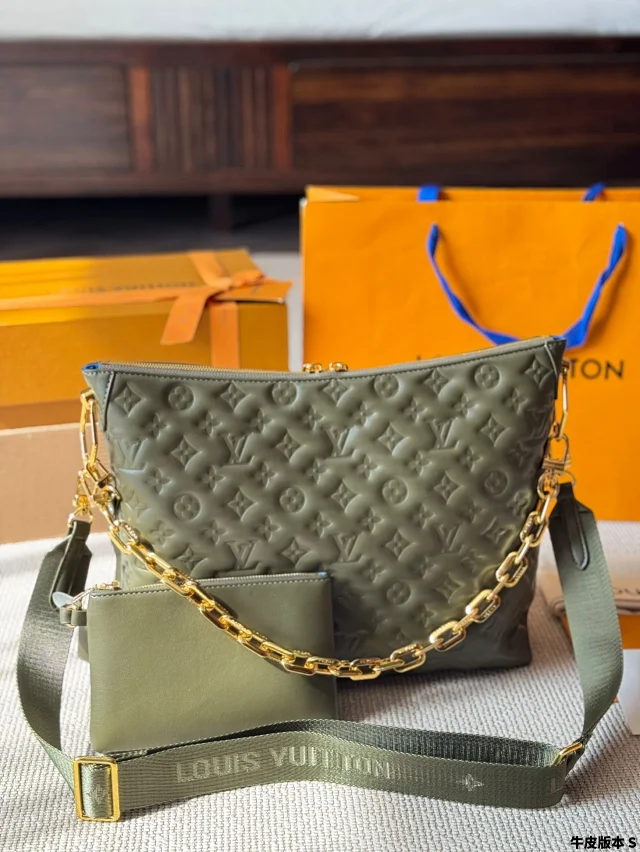 LV Coussin PM handbag in black made from puffy lambskin embossed with the Monogram pattern