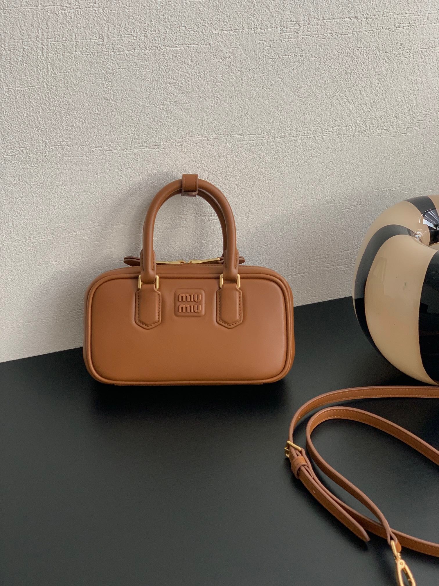 Miu Miu Arcadie leather bag in cognac brown