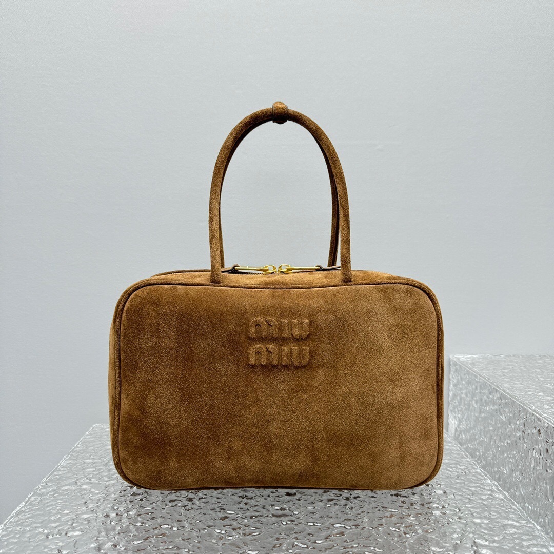 Miu Miu Beau logo-debossed suede bag in caramel brown