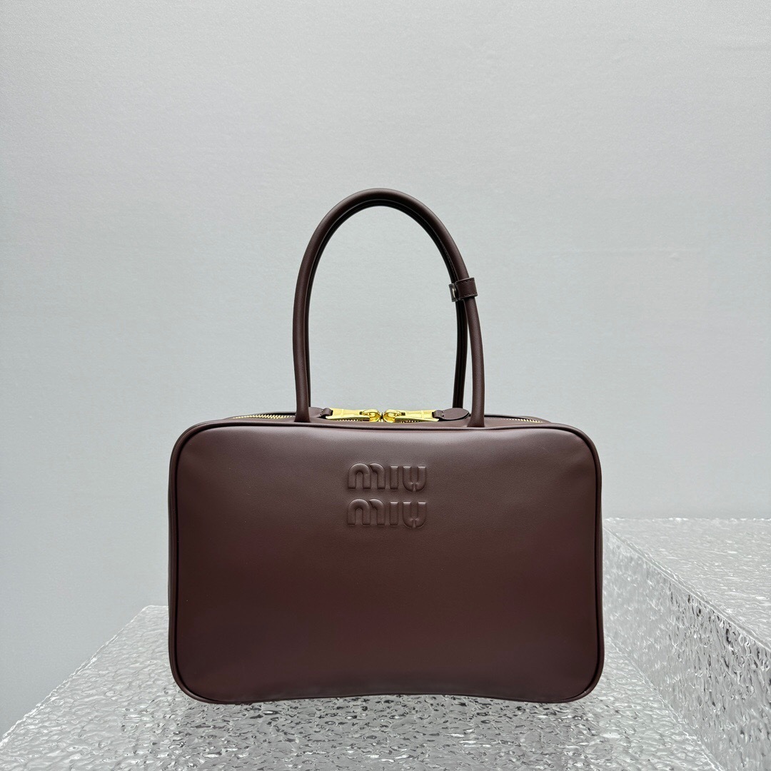 Miu Miu Beau leather bag in coffee brown with a debossed logo