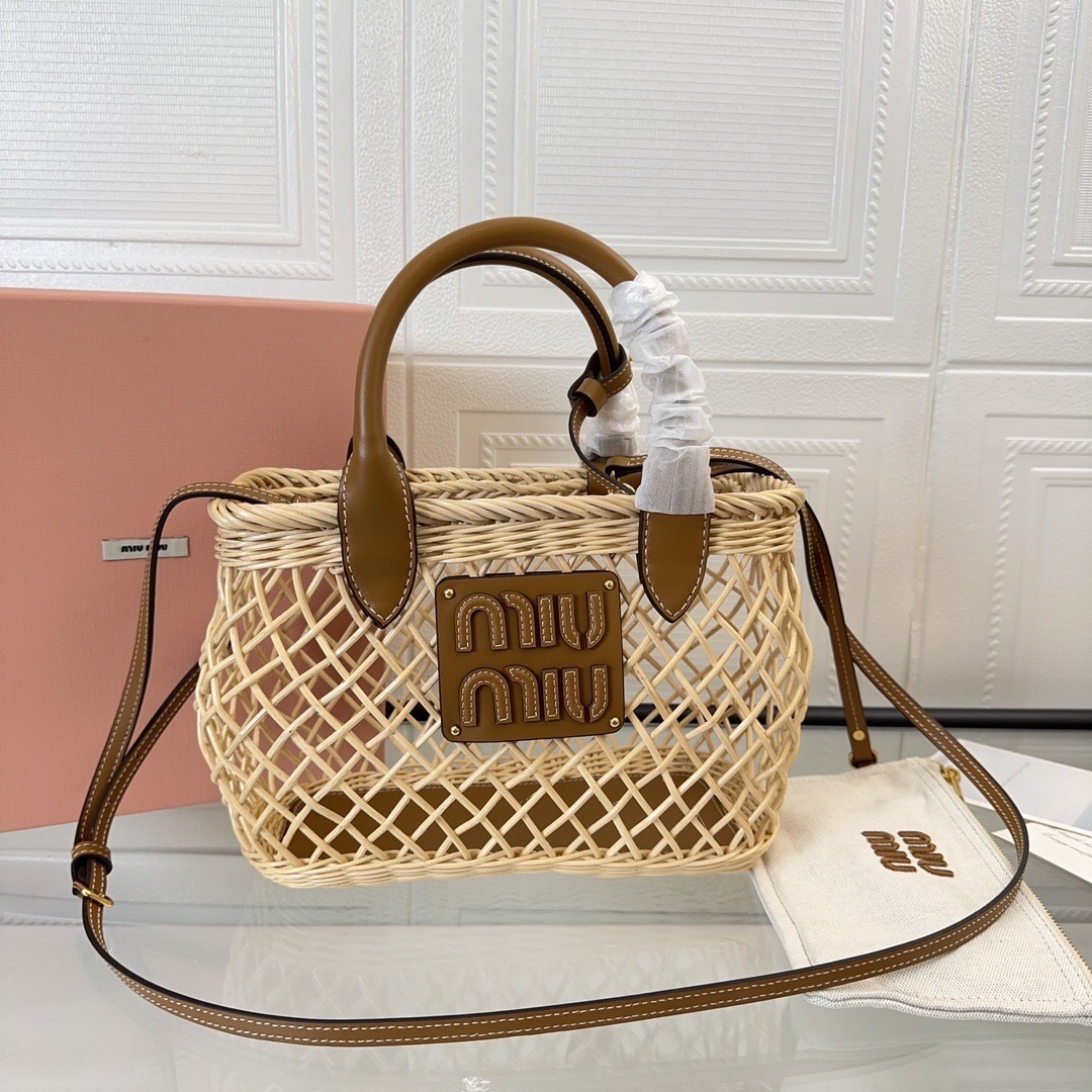 Miu Miu woven straw tote bag with leather trim and an appliqué logo